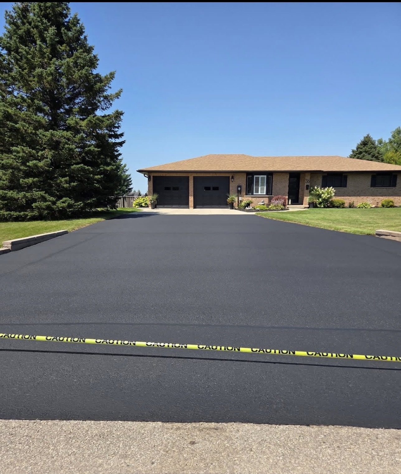 Same driveway after sealing