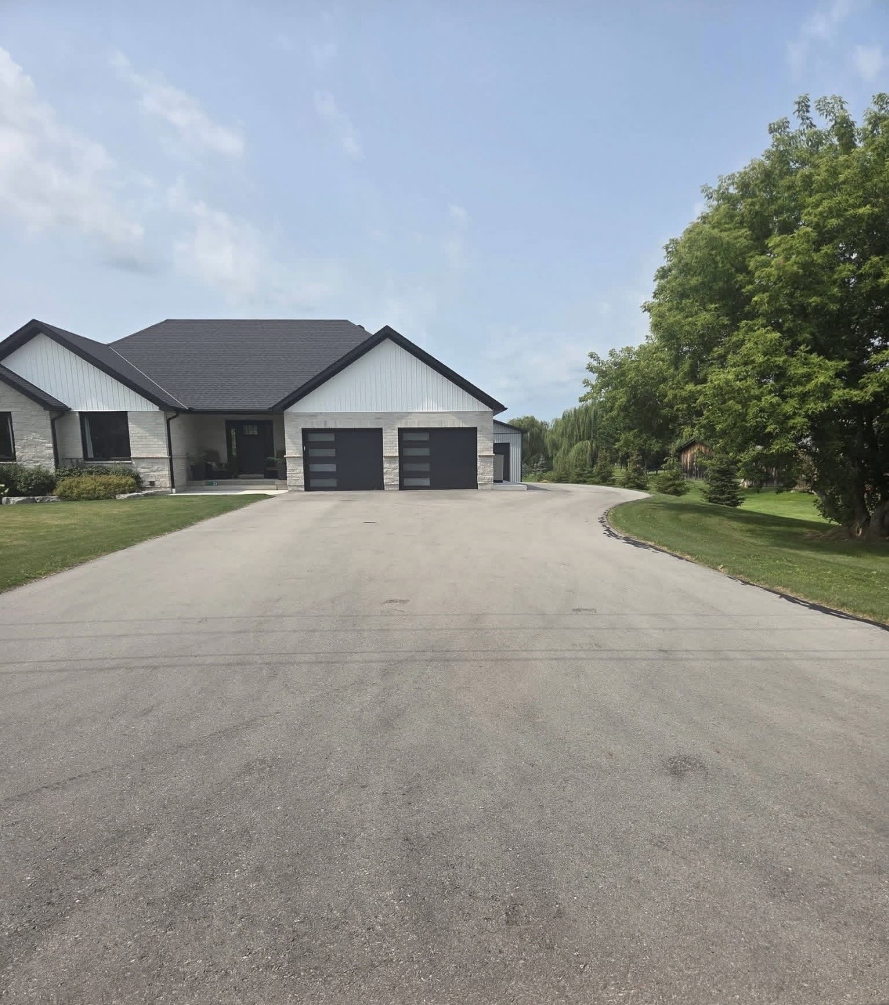 Large residential driveway before sealing