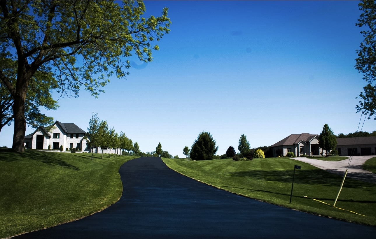 Long freshly sealed residential driveway